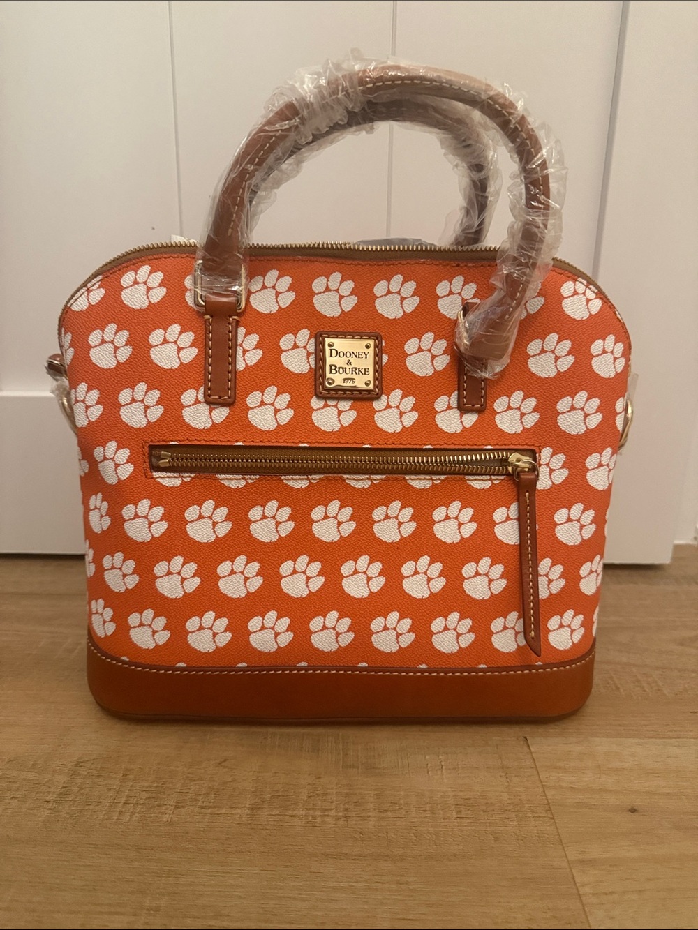 Dooney & Bourke Orange and White Paw-Print Clemson Dome Satchel